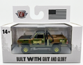 Model truck in packaging with 'M2 Machines' logo and American flag on a white background