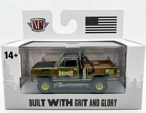 Model truck in packaging with 'M2 Machines' logo and American flag on a white background