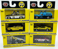 Stacked set of six M2 Machines Mooneyes 1/64 scale diecast vehicles in yellow display boxes, featuring a black and white 1990 Chevy 1500 Silverado, a blue and black 1995 Chevy S-10 with camper shell, a yellow VW Microbus, a yellow 1970 Dodge Challenger R/T, a black and white Moon Equipped Sprint Car, and a red 1971 Nissan Skyline GT-R, all on a pure white background for 501 Diecast.